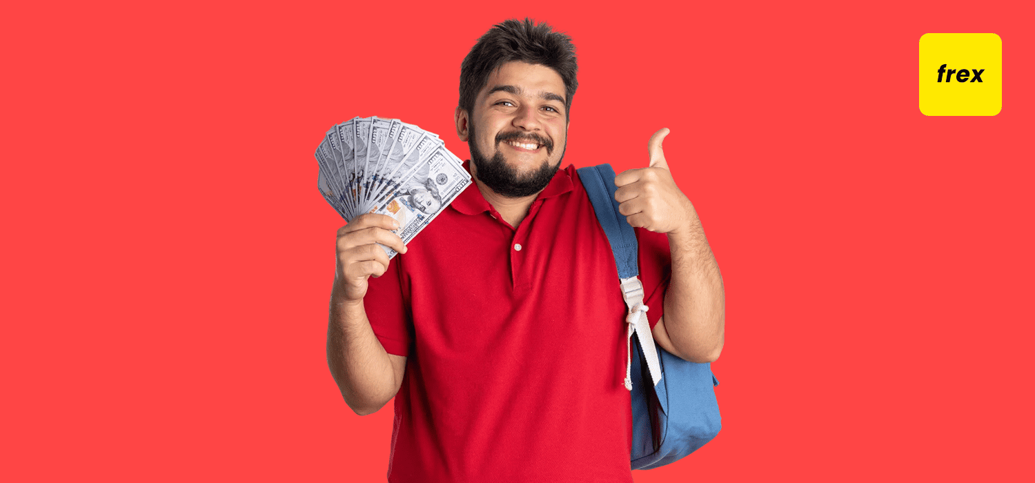 Man holding lot of cash looking happy
